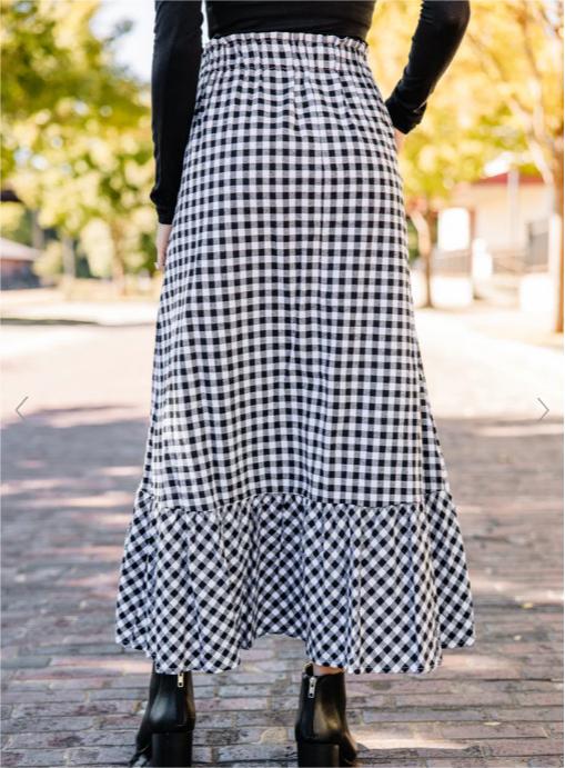 Falda holgada informal de cintura alta con cordones, bolsillos, costuras a cuadros blancos y negros, longitud media, estilo swing grande