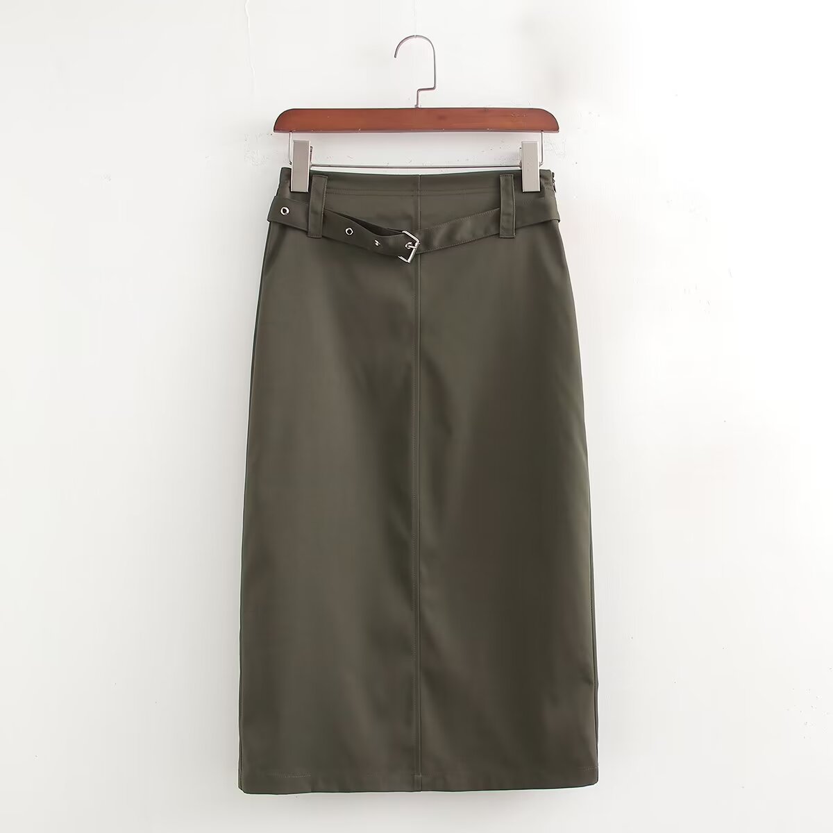 Jupe mi-longue droite taille haute, couleur unie, avec ceinture, idéale pour l'automne et l'hiver. Affinante.