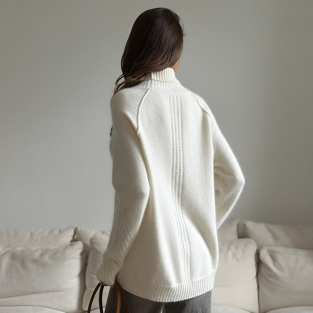 Pull en maille blanc ample et décontracté pour femme, idéal pour l'automne et l'hiver.