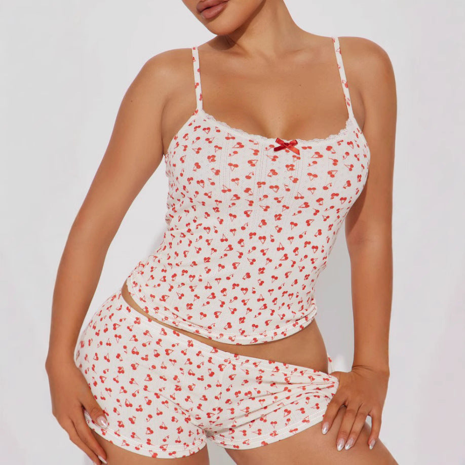 Ensemble deux pièces pyjama fille avec short et ourlet en dentelle à imprimé cerises.